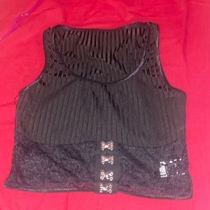 Black shirt, low cut with lace.